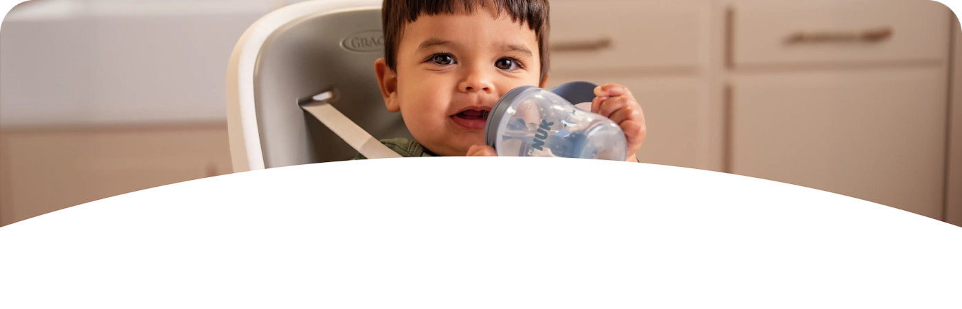 Baby with NUK Perfect Match Learner bottle straw