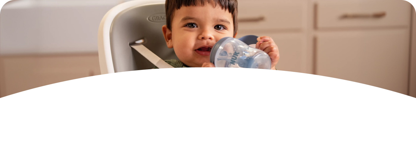 Baby with NUK Perfect Match Learner bottle straw