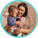 Mother with Baby and Learner bottle