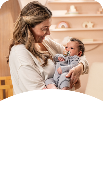 Mother with baby and soother