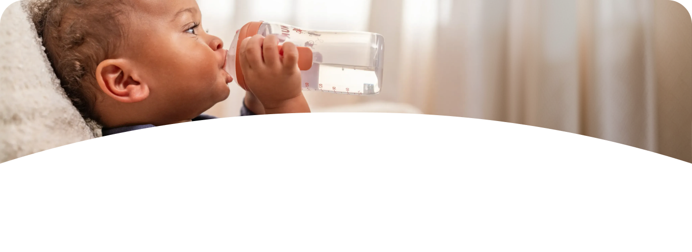 Baby with Learner bottle