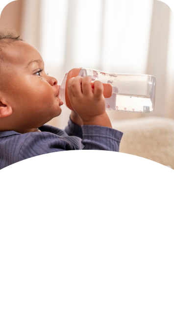 Baby with Learner bottle