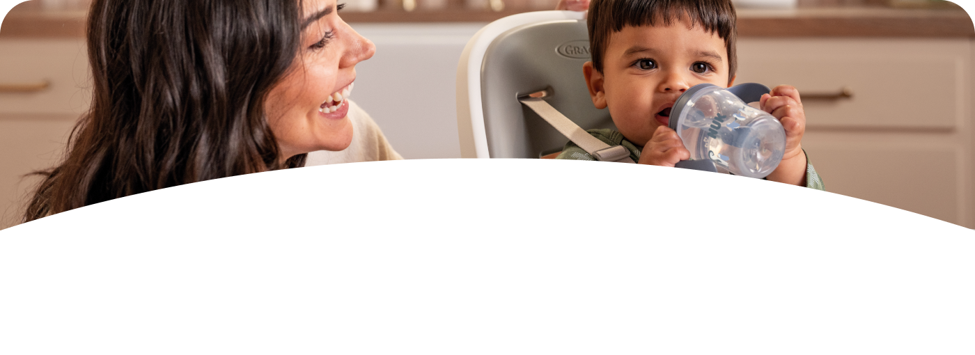 Mother and Baby with Learner bottle