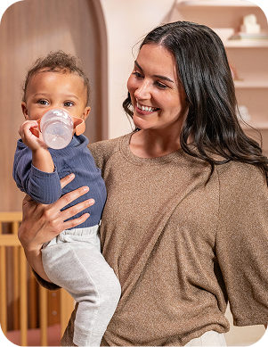 Mother with Baby and Learner bottle