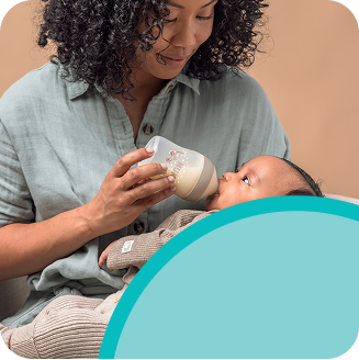 Mother with Baby and baby bottle