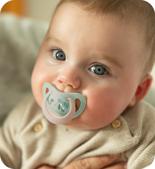Baby with soother