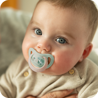 Baby with soother