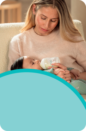 Mother with Baby and baby bottle